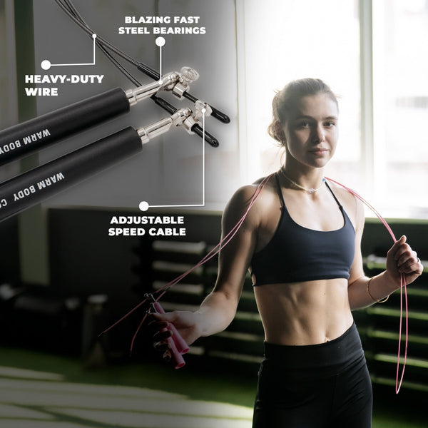 Adjustable Lightweight Jump Rope, woman holding a pink jump rope on her shoulders – Warm Body Cold Mind