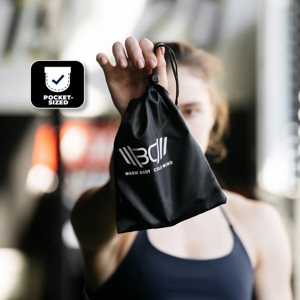 Цoman holding a black bag with a Adjustable Lightweight Jump Rope in her hand – Warm Body Cold Mind