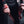 Man puts on Red Weight Lifting Wrist Straps V1 to lift the barbell