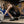 Person in WOMEN'S WEIGHTLIFTING COMPRESSION SINGLET S-4 performing a weightlifting exercise in a gym setting - Warm Body Cold Mind