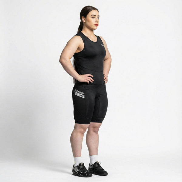 Person wearing a WOMEN'S WEIGHTLIFTING COMPRESSION SINGLET S-4 on a white background  - Warm Body Cold Mind