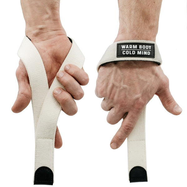 Straps V2 Pro White with a brand logo being worn on hands against a white background - Warm Body Cold Mind